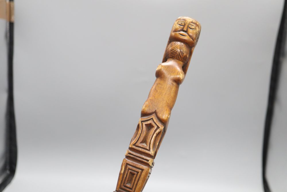 A carved fertility stick, c.1840, length 79cm